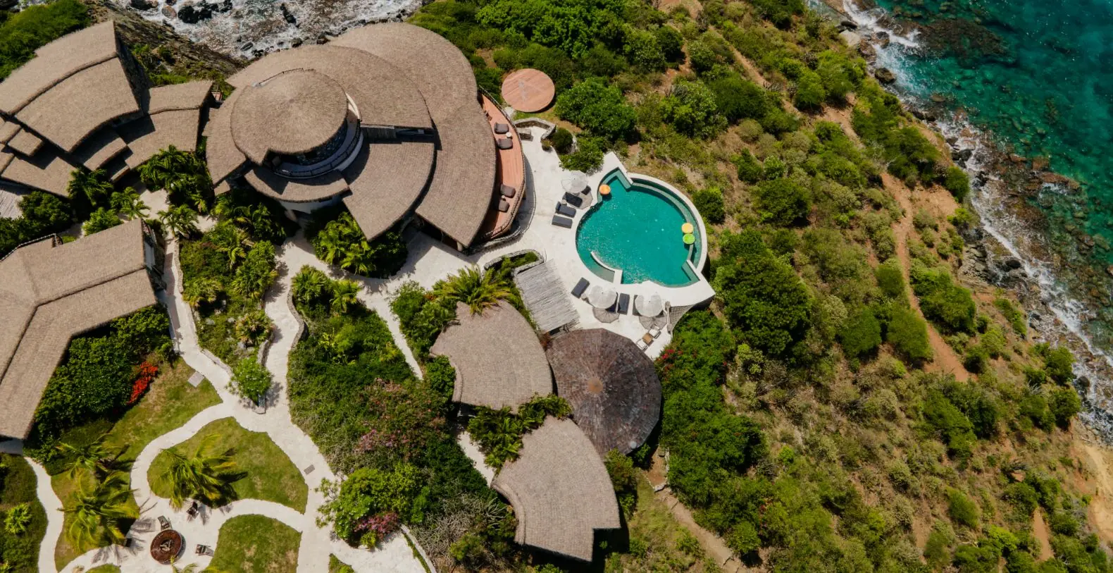 Private island aerial retreat surrounded by turquoise water